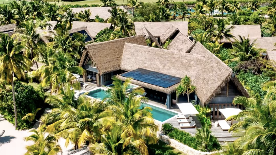 eco-friendly-luxury-villa-solar-panels-thatch-roof