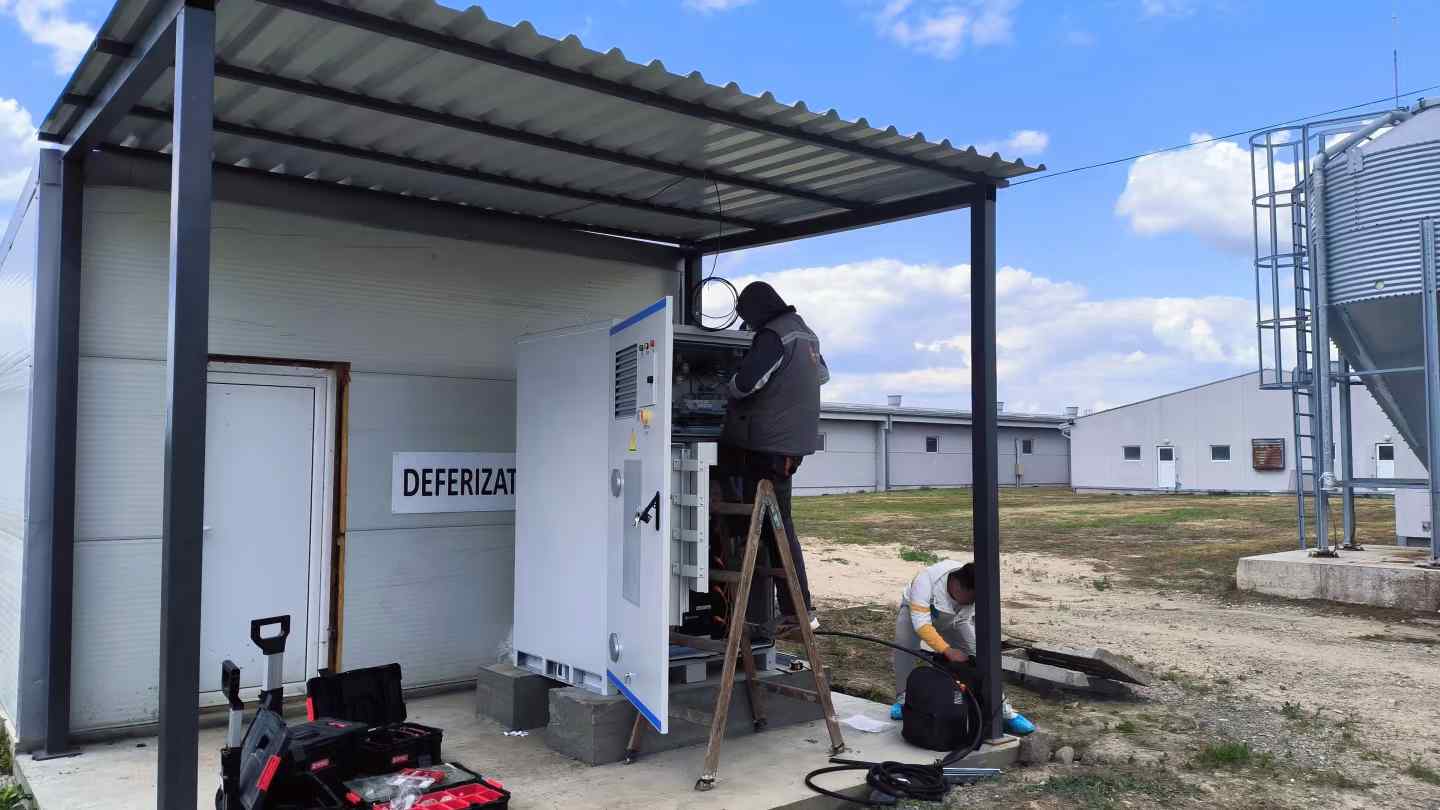 Reliable After sales Maintenance & Support | Long term Solar Performance Technical team performing on site maintenance and technical support for an off grid solar energy storage system at a farm.