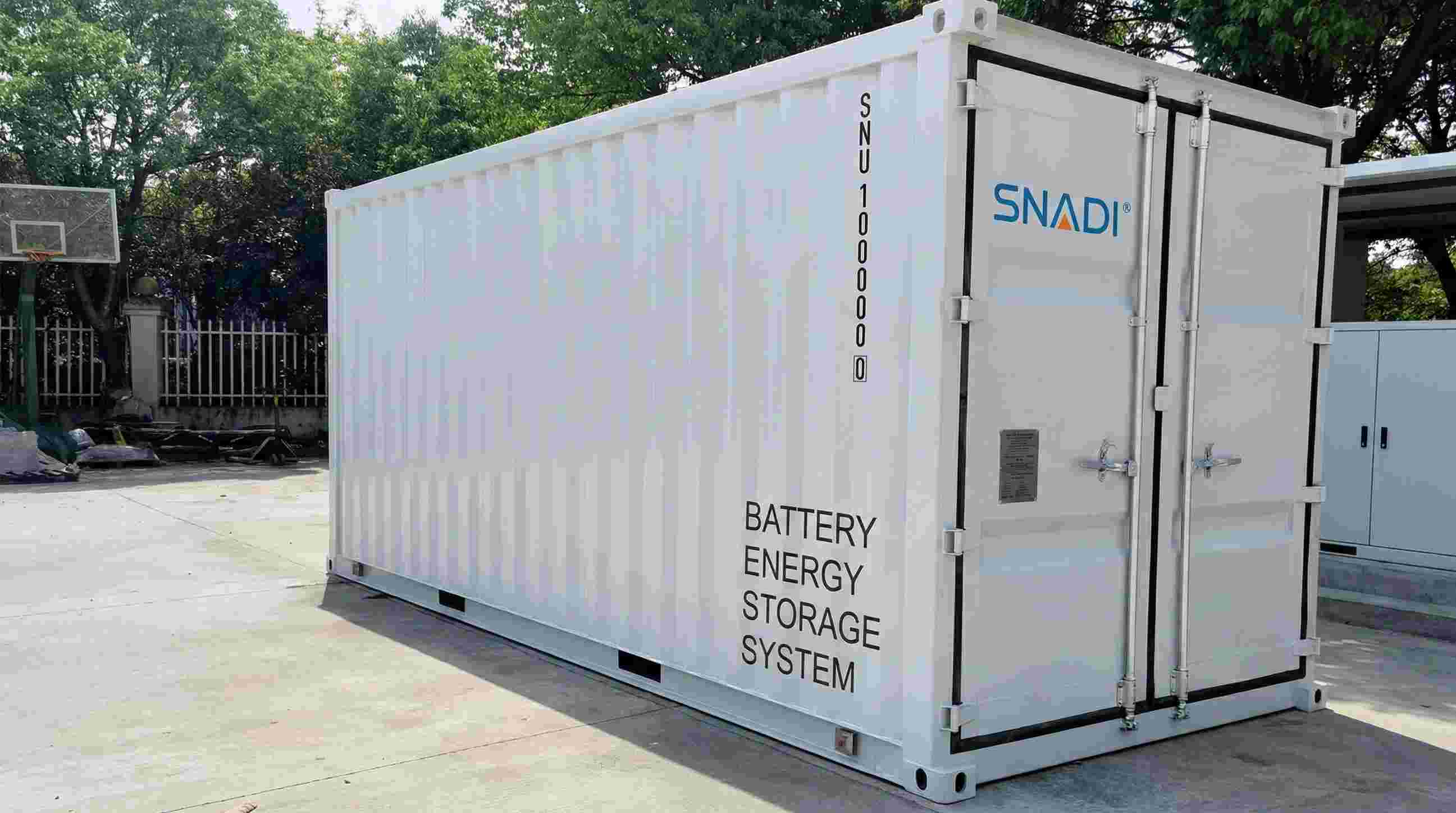 Industrial Scale Battery Energy Storage System (BESS) | SNADI Large SNADI industrial battery energy storage system (BESS) container installed outdoors.