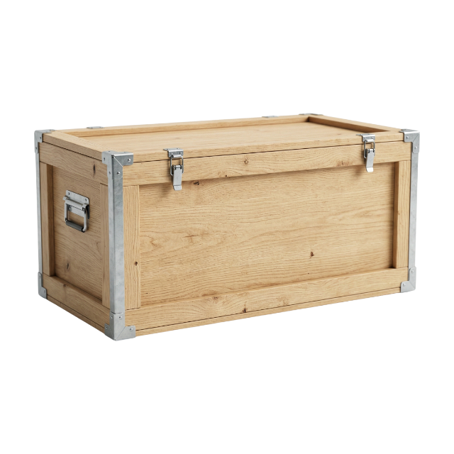 A detailed close-up of a sturdy, solid oak wooden shipping and storage crate on a white background, complete with metal corner protectors, front latches, and a side handle.